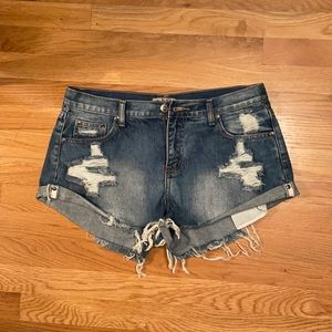 Distressed denim shorts